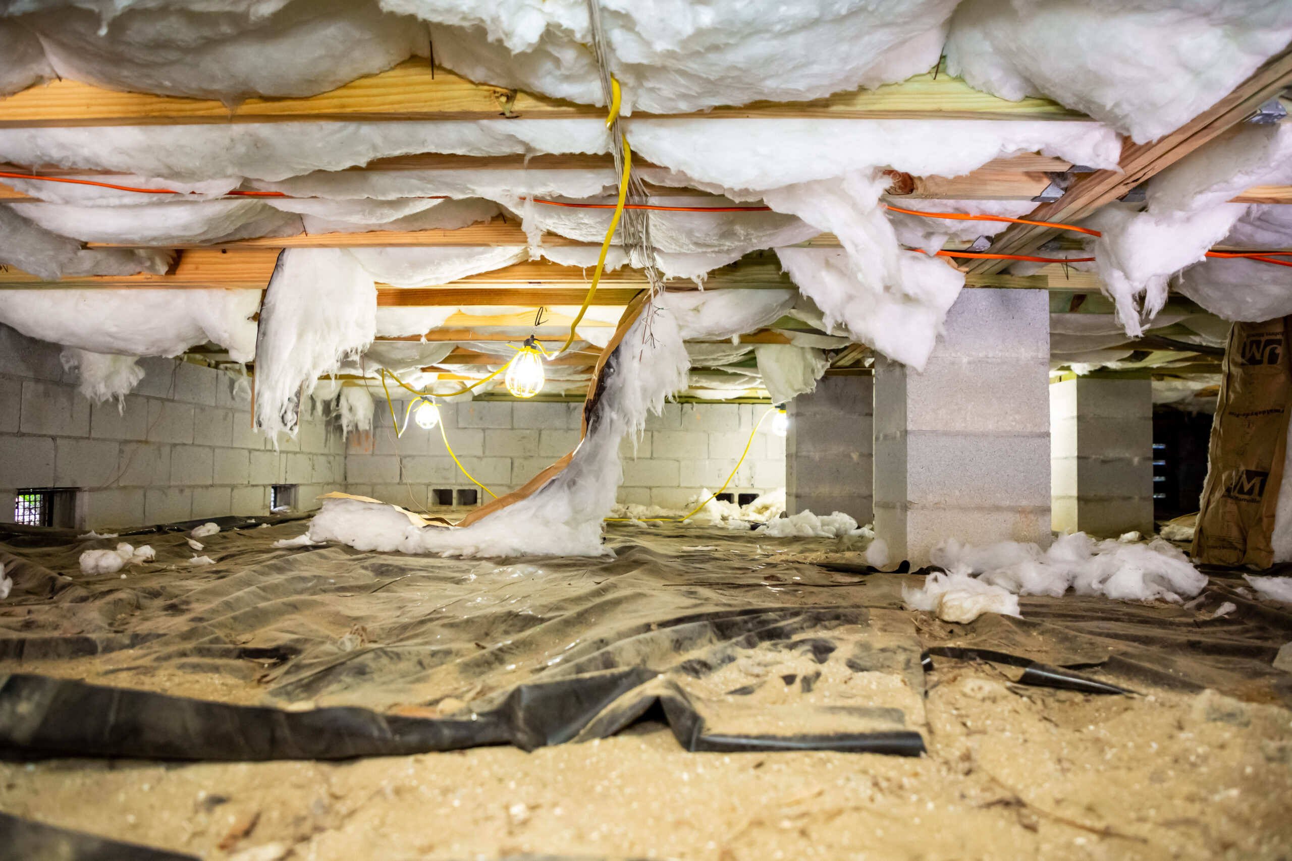 A Crawl Space With Damaged Insulation| Crawl Space Contractor Delmarva